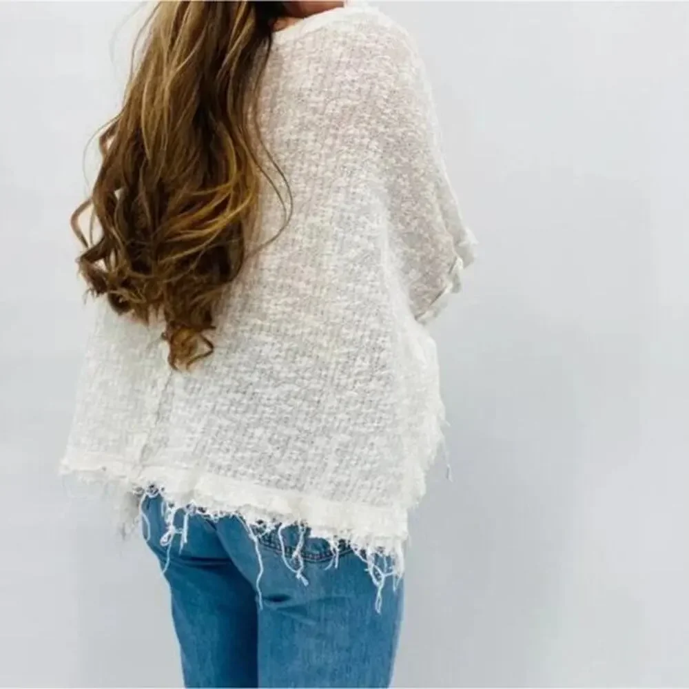 Free People white thin sheer knit raw hem oversized‎ top